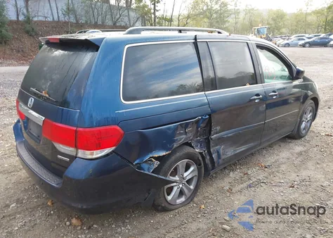 2010 Honda Odyssey Touring z USA, uszkodzony, nr VIN 5FNRL3H99AB058887